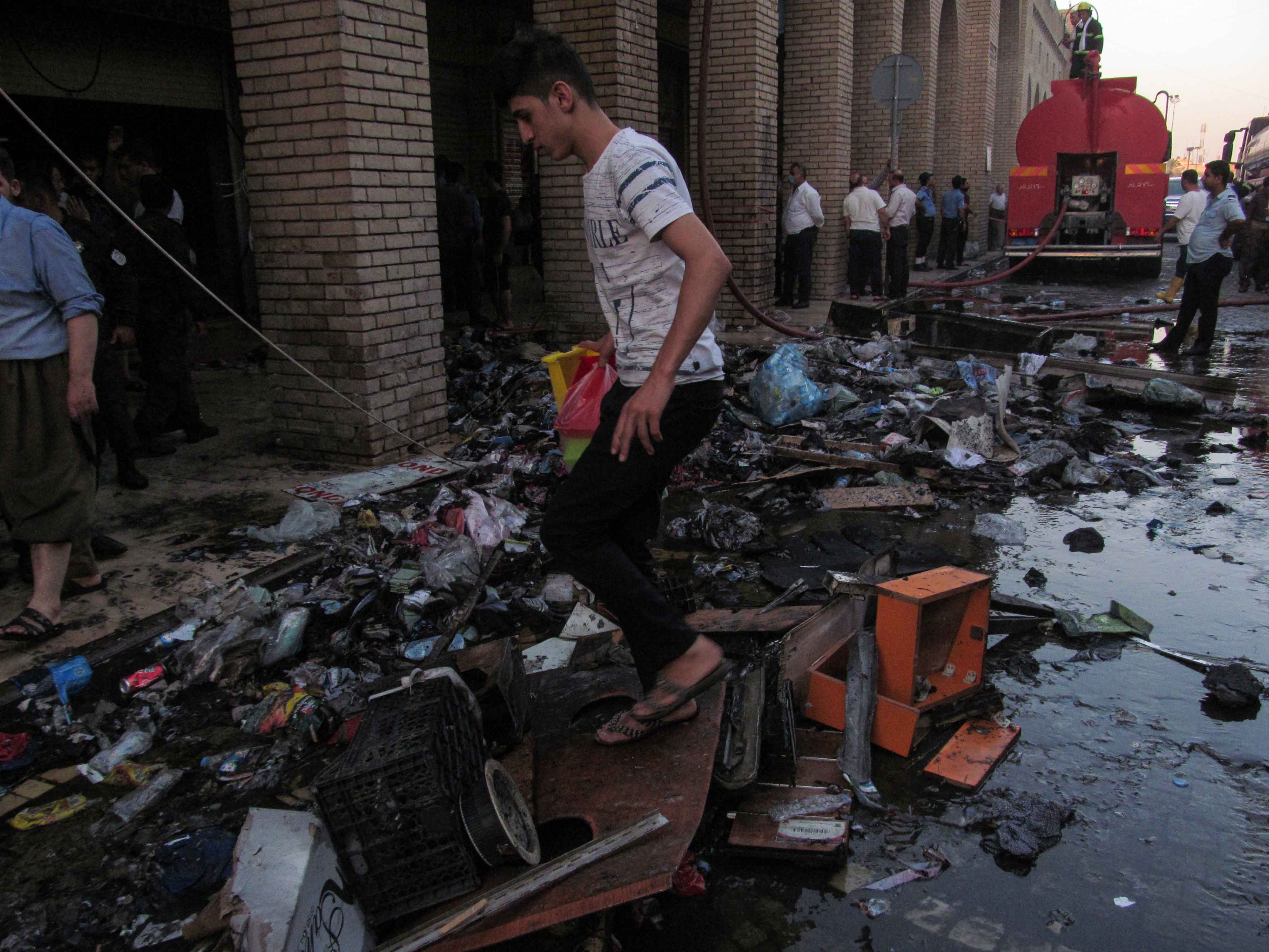 PHOTOS: Firefighters extinguish blaze in Erbil's old market 